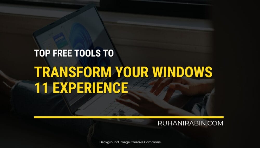 Someone is using a laptop with Windows 11, and theres text that says, Best free tools to enhance your Windows 11 experience. There is also a website link at the bottom: ruhanirabin.com.