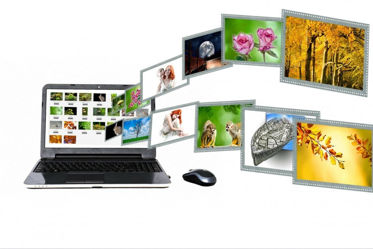 A laptop with a mouse beside it shows pictures spreading outwards like rolls of film. These images include flowers, animals, and nature scenes. This lively display highlights how flexible a business's mobile-friendly website can be, all set against a simple white background.