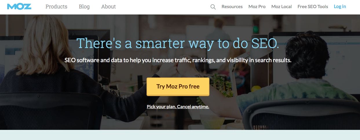 The homepage of a website displays two people working on computers. There's a message that says, "There's a smarter way to do SEO." You can click a button to try "Moz Pro" for free. At the top of the page, there are links you can use to find digital marketing resources and different tools and insights.