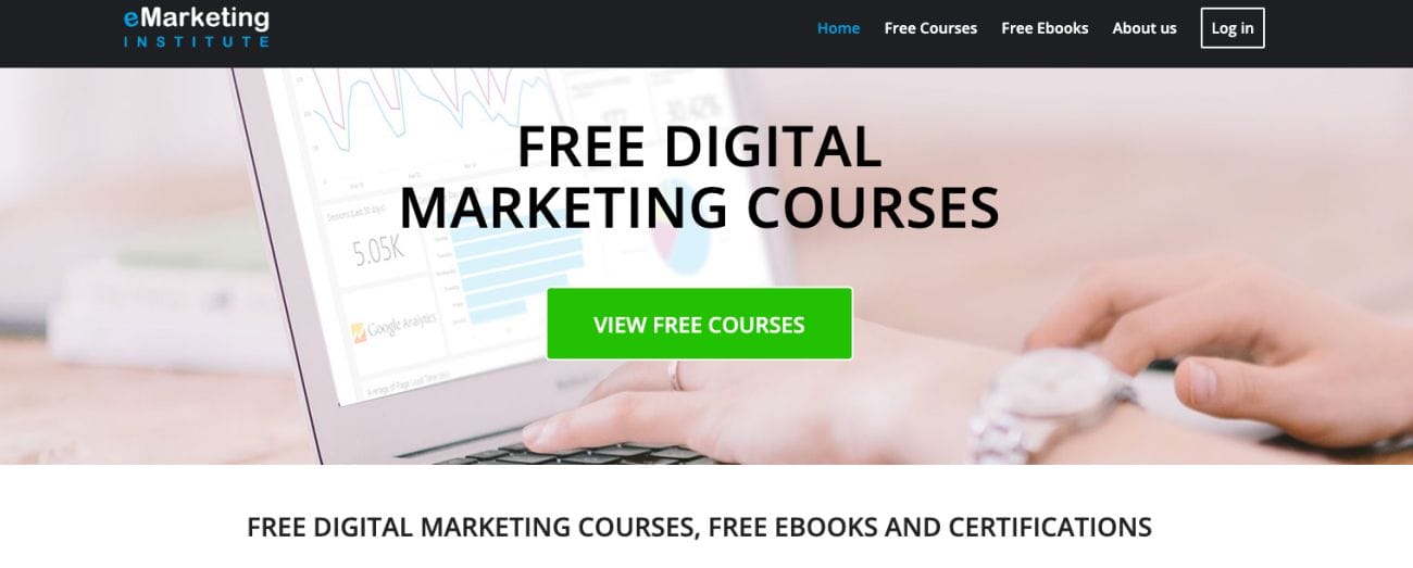 A screenshot of the eMarketing Institute's website displays free digital marketing resources. There is a green button labeled "View Free Courses" and menu links for courses, ebooks, and account login. In the background, you can see someone working on a laptop.