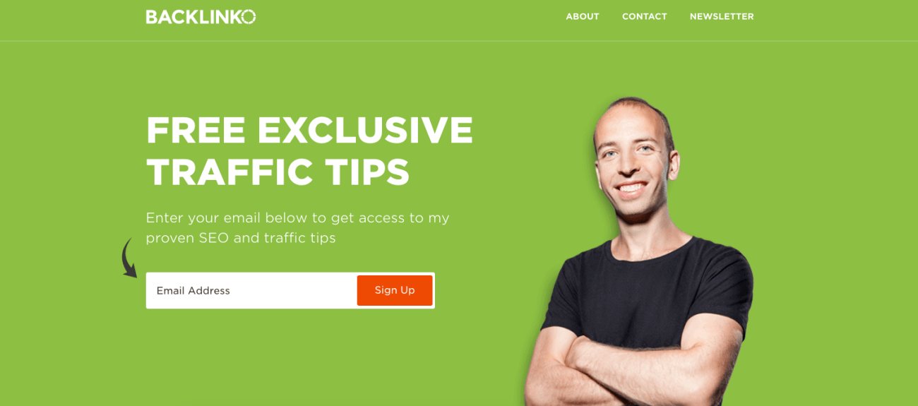 The website has a green background and shows a person with folded arms next to some text that promotes "Free Exclusive Traffic Tips" along with an email sign-up form. At the top of the page, there are links to pages like About, Contact, Newsletter, and digital marketing resources.